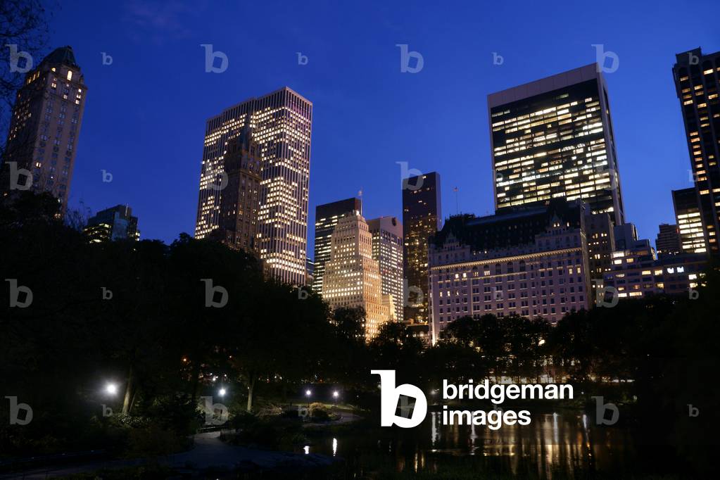 Buildings in Midtown Manhattan, viewed from South Central Park at dusk, New York City, New York, USA (photo)