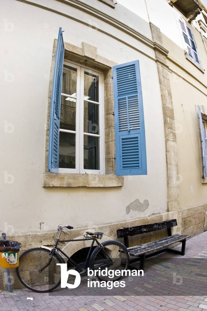 Bicycle Parked Under Window, Cyprus (photo)