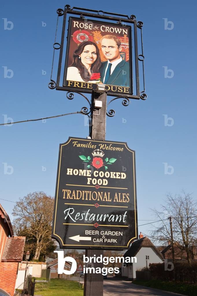 Prince William and Catherine, Duchess of Cambridge Painted on Pub Sign at High Street, Tilshead, Wiltshire, England, UK  (photo)