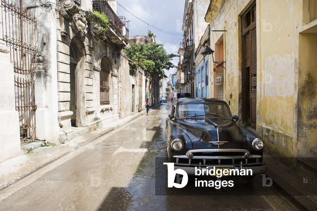Vintage Car Parked in Street (photo)