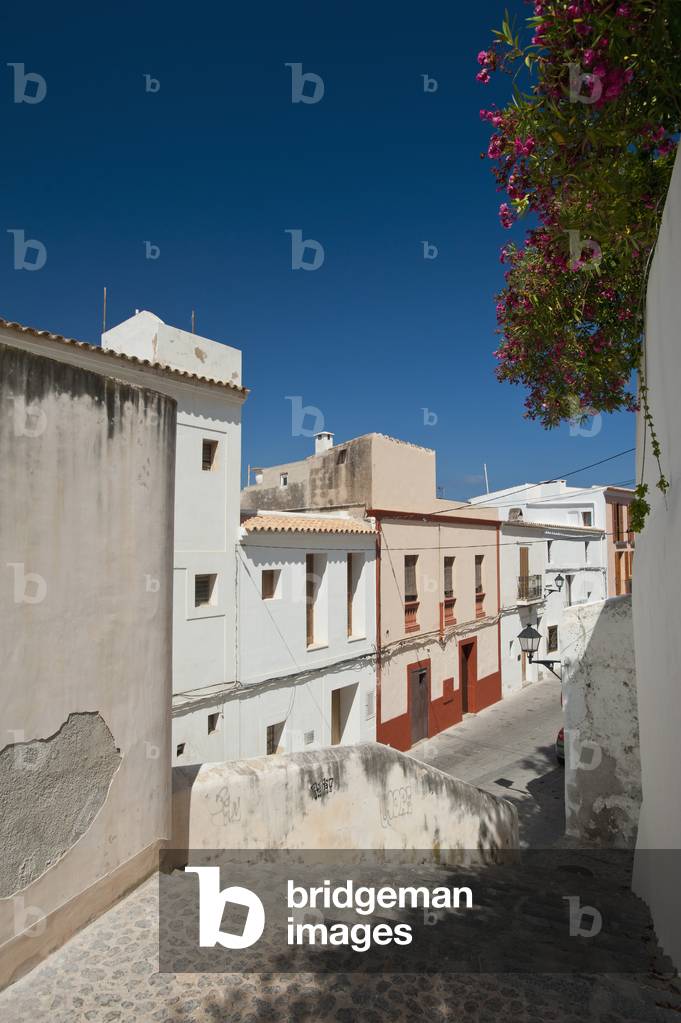 Spain, Ibiza, Looking down alley in Dalt Vila, Ibiza Town (photo)
