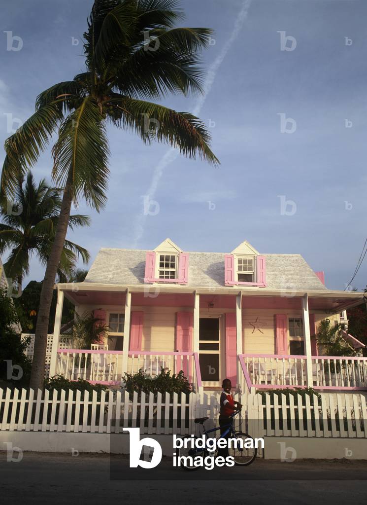 Bahamianboy  and Pastel Painted House in Dunmore Town (photo)