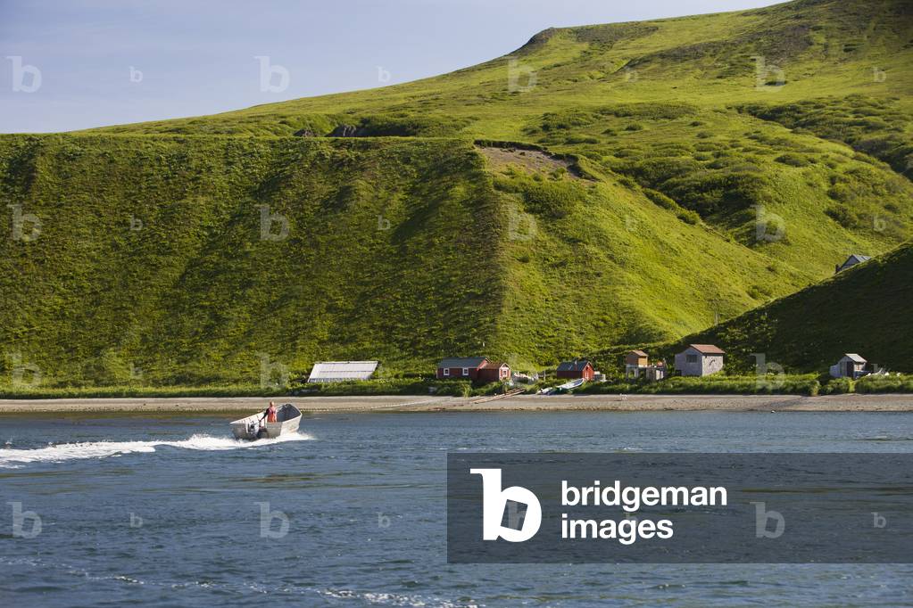 The Laukitis Family Skiff Returning Home To Their Fishcamp On The Westernmost End Of The Alaska Peninsula In False Pass, Also Known As Isanotski Strait, Southwest Alaska, Summer (photo)