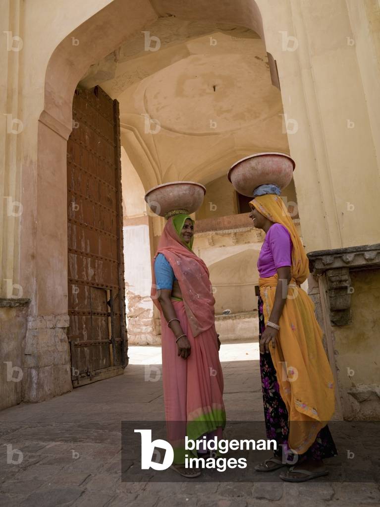 Women Balancing Bowls on Top of Their Heads, Amber Fort, Rajasthan, India (photo)