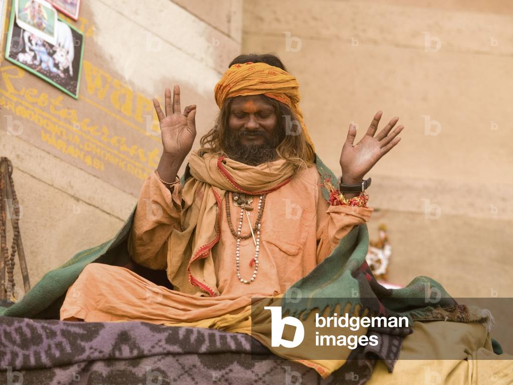 Hindu Man Worshipping by the Ganges, the Ganges River, Varanasi, India (photo)
