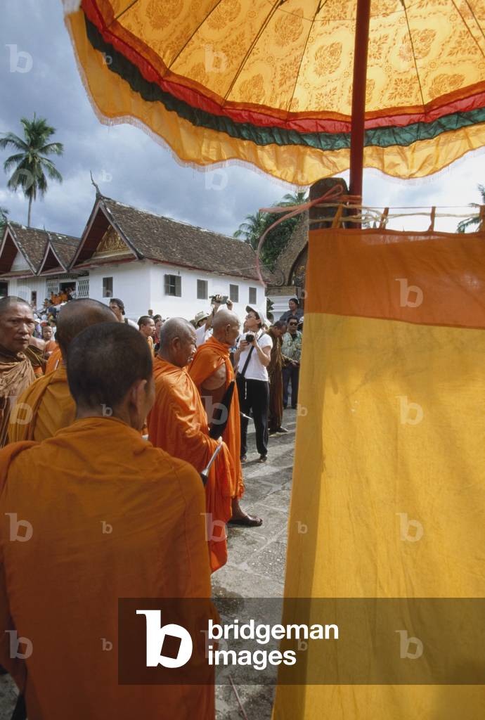 Monks Arriving at Wat Xieng Thong (photo)