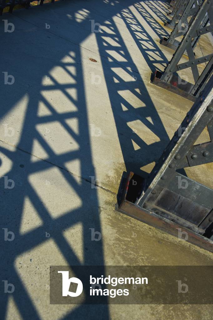 Shadows of steel beams on the pavement, Hamburg, Germany (photo)