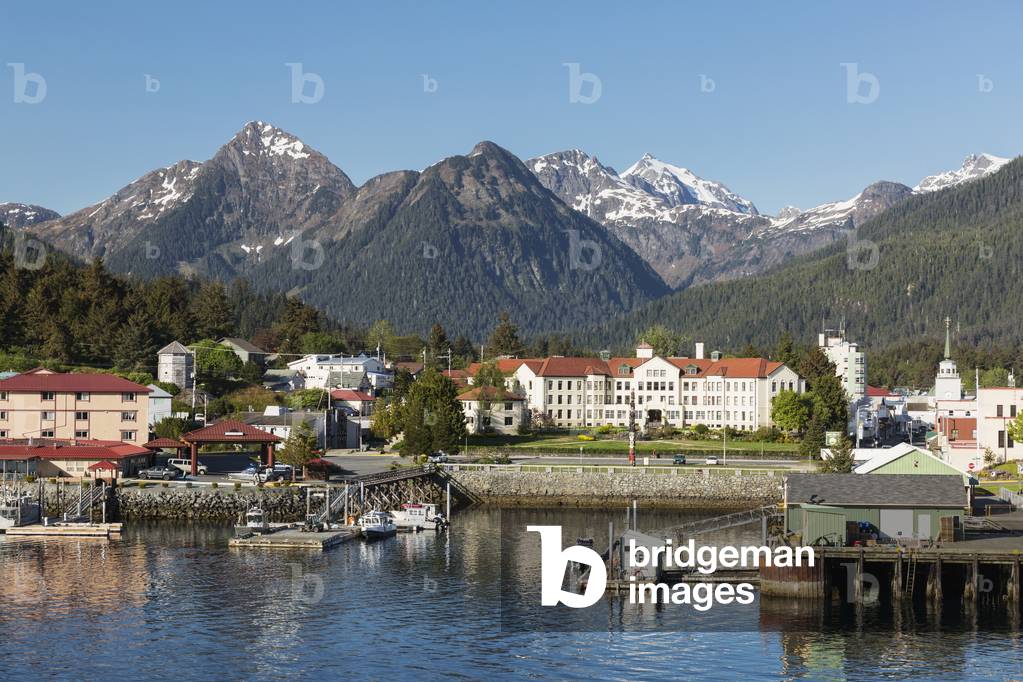 The Pier at the Sitka Harbor with downtown Sitka and the Sisters mountains in the background, Southeast Alaska, USA, Summer (photo)