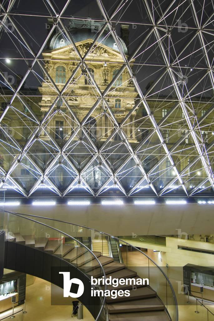 Looking Out of The Pyramid to The Louvre Museum at Night, Paris, France (photo)