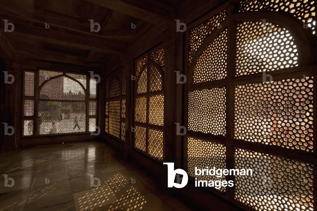 India, Fatehpur Sikri, Agra, Looking through stone lattice grills in Jami Masjid (photo)
