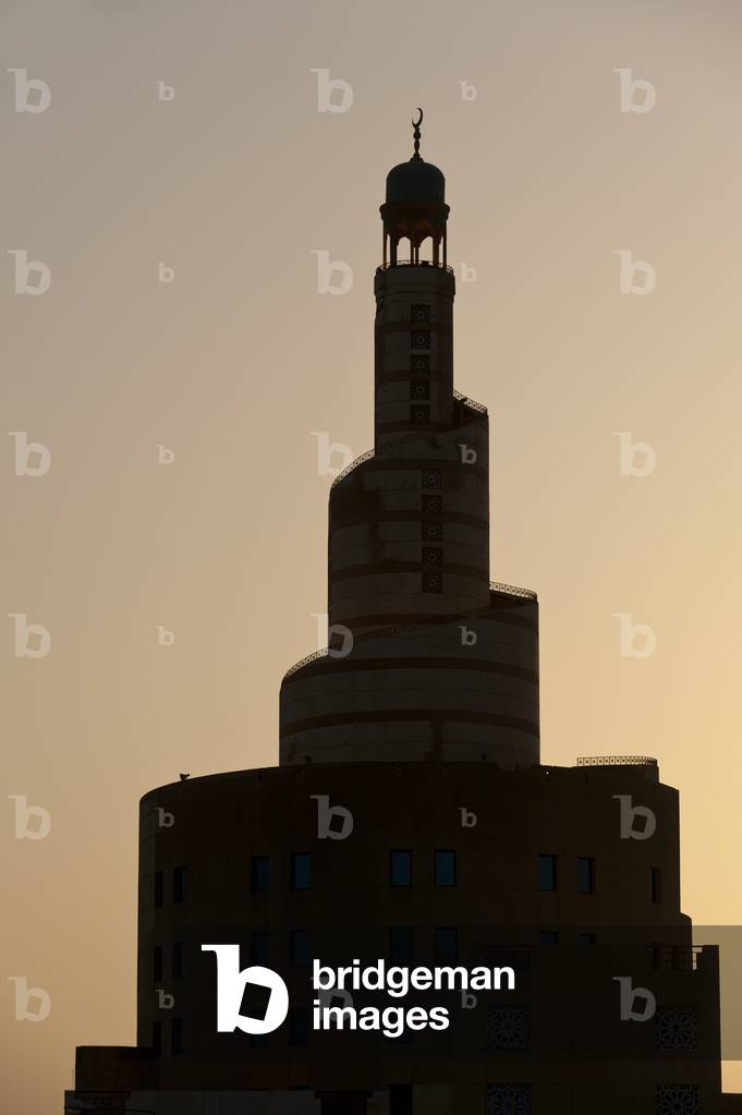 Silhouette at dusk of the Qatar Islamic Culture Center and Mosque (Fanar), Doha, Qatar (photo)