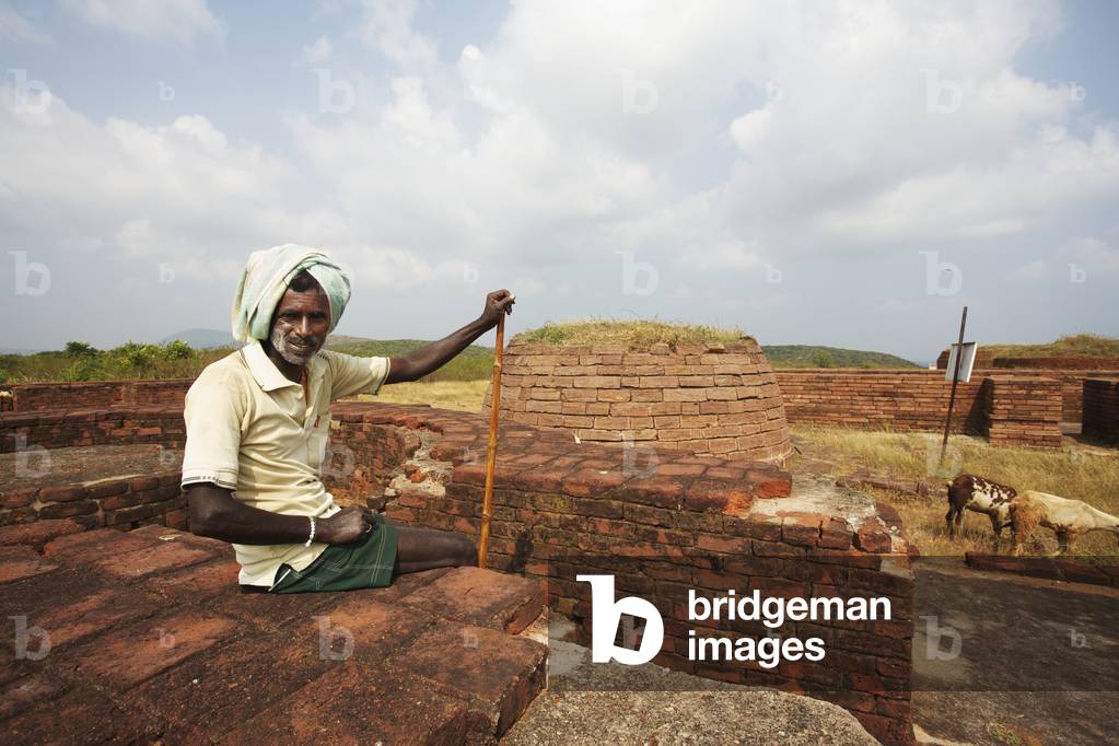 A man at the ruins of the Thotlakonda Buddhist Complex, Visakhapatnam, Andhra Pradesh, India (photo)