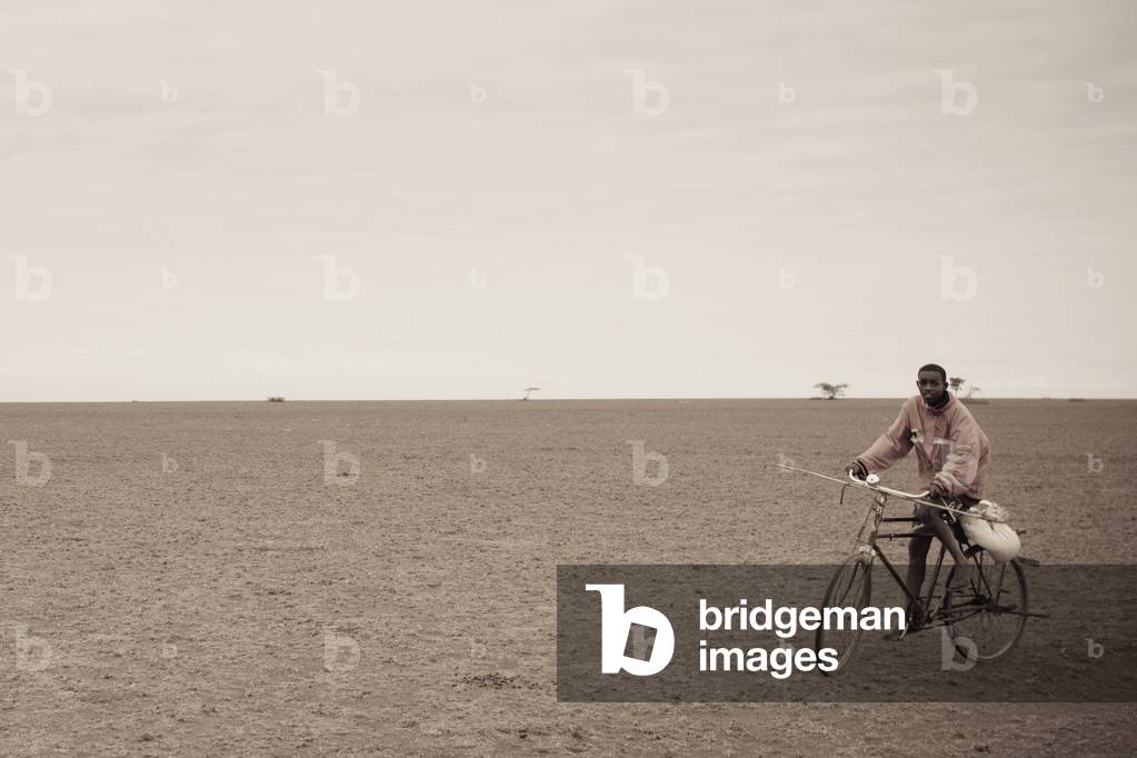 Man Riding a Bike, Kenya, Africa (photo)