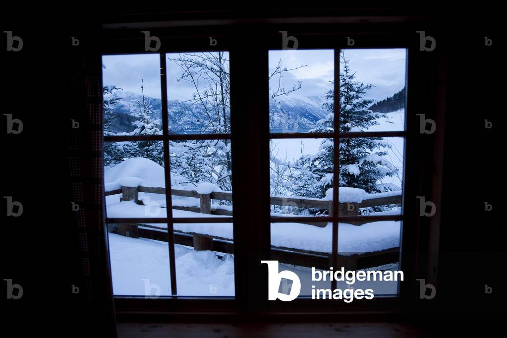 View out of the window of a Brekke rental cabin in winter, Ortnevik, Sognefjord, Norway (photo)