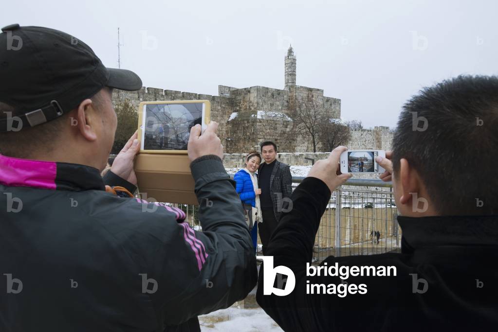 Israel, Jaffa Gate, Jerusalem, Men photographing couple (photo)