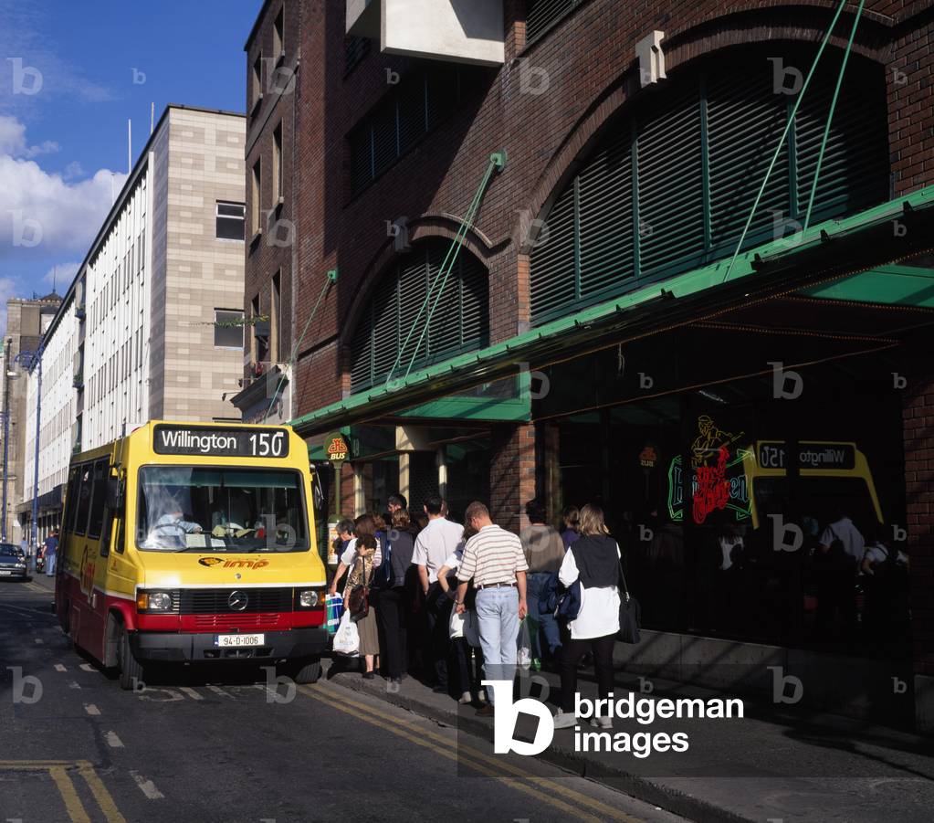 Temple Bar,Co Dublin,Ireland;People Queuing For The Bus (photo)