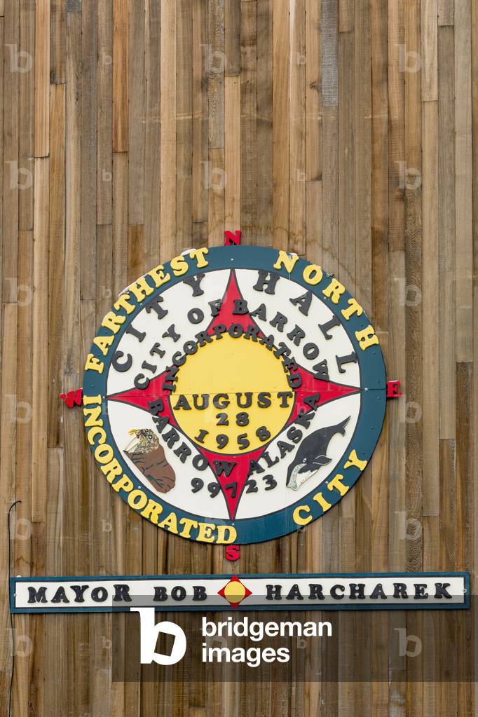 Badge on the wall marking the farthest north incorporated city, Barrow City Hall, Barrow, North Slope, Arctic Alaska, USA, Winter (photo)