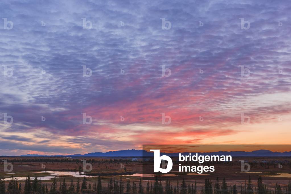 Scenic view of the village of Noatak with the Baird Mountains in the distance at sunrise, Arctic Alaska, USA, Autumn (photo)