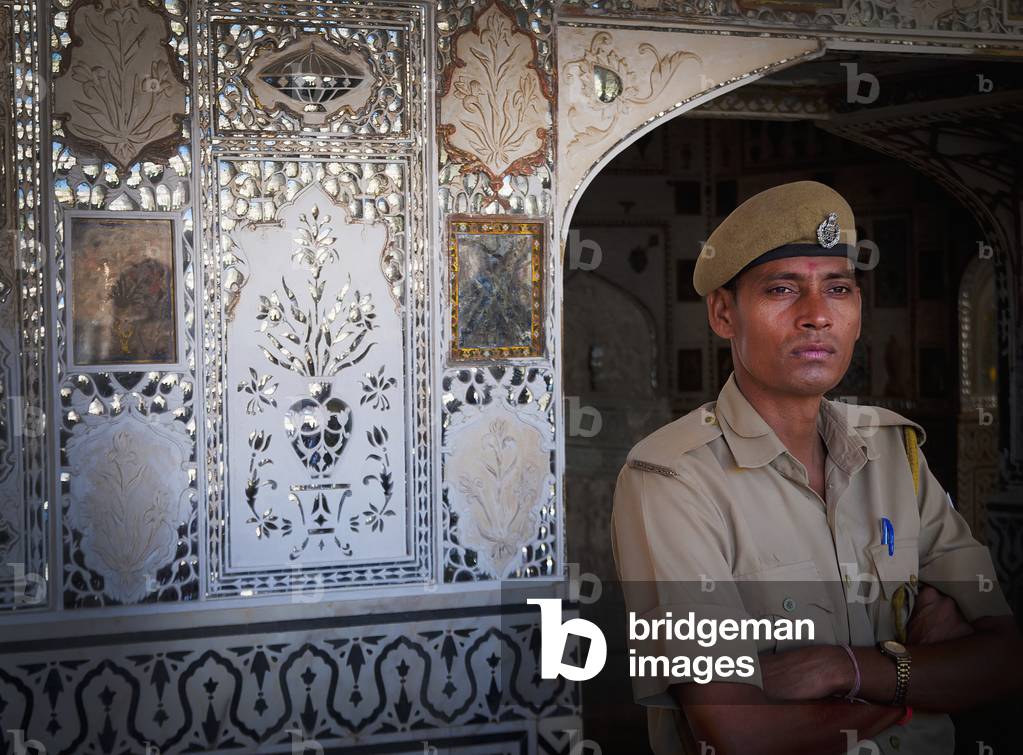 Soldier By Ornate Maiolic Wall, Jaipur, Rajasthan, India (photo)