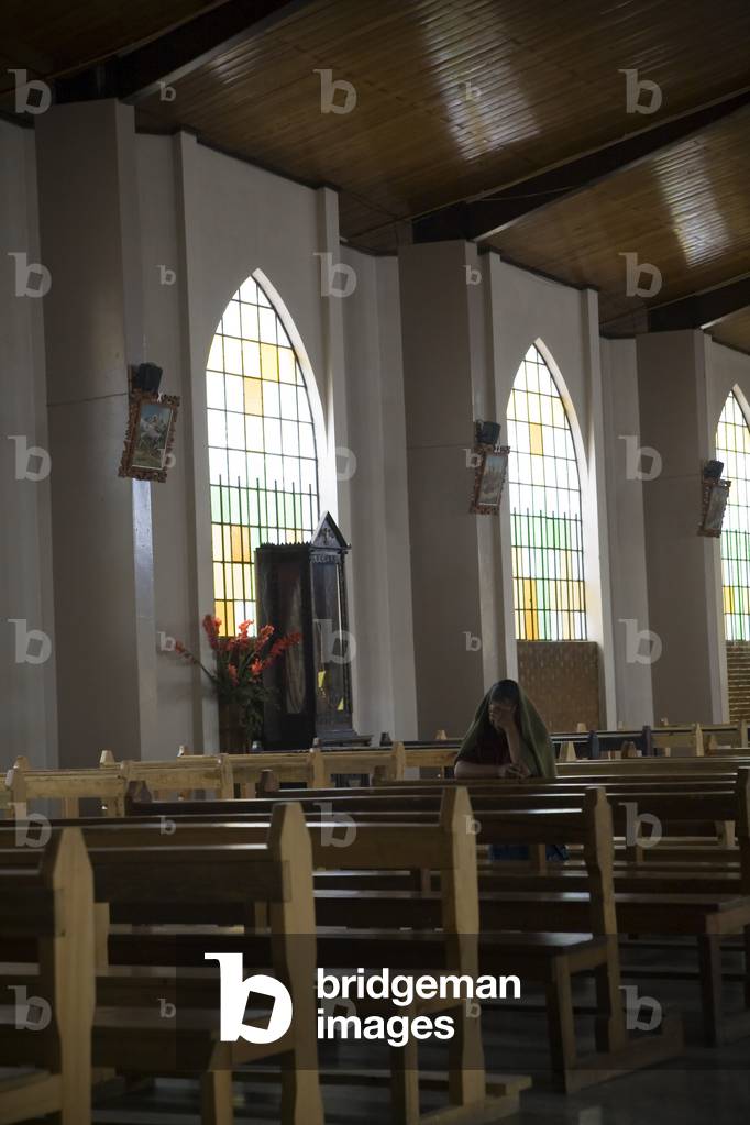 Patzicia, Guatemala, Lone Woman Praying in Church (photo)