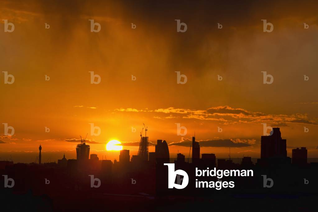 City of London Skyline with Setting Sun, London, England, UK  (photo)