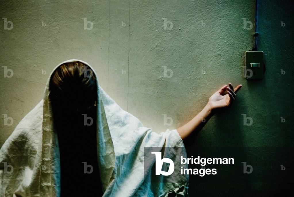 Mysterious Shrouded Figure Reaching For Light Switch, Mexico (photo)