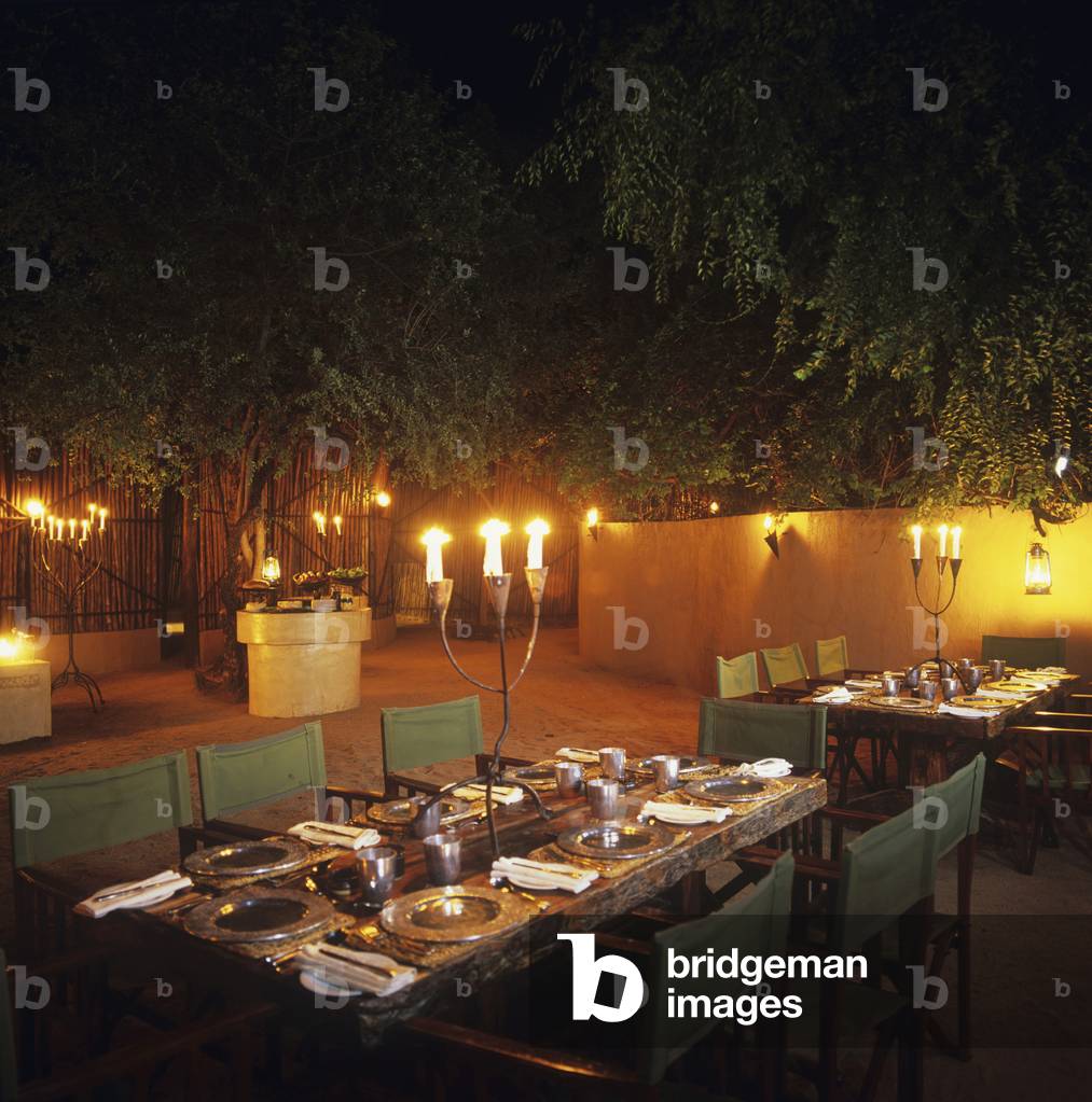 Illuminated Dining Room in Garden of Londolozi Tree Camp, South Africa (photo)