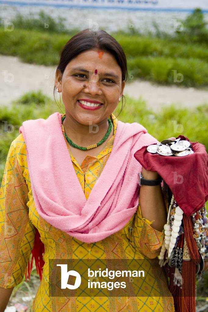 Woman Selling Items At Laxmi Narayan Temple Near Huge Chartarpur Road Temple, New Delhi, India (photo)