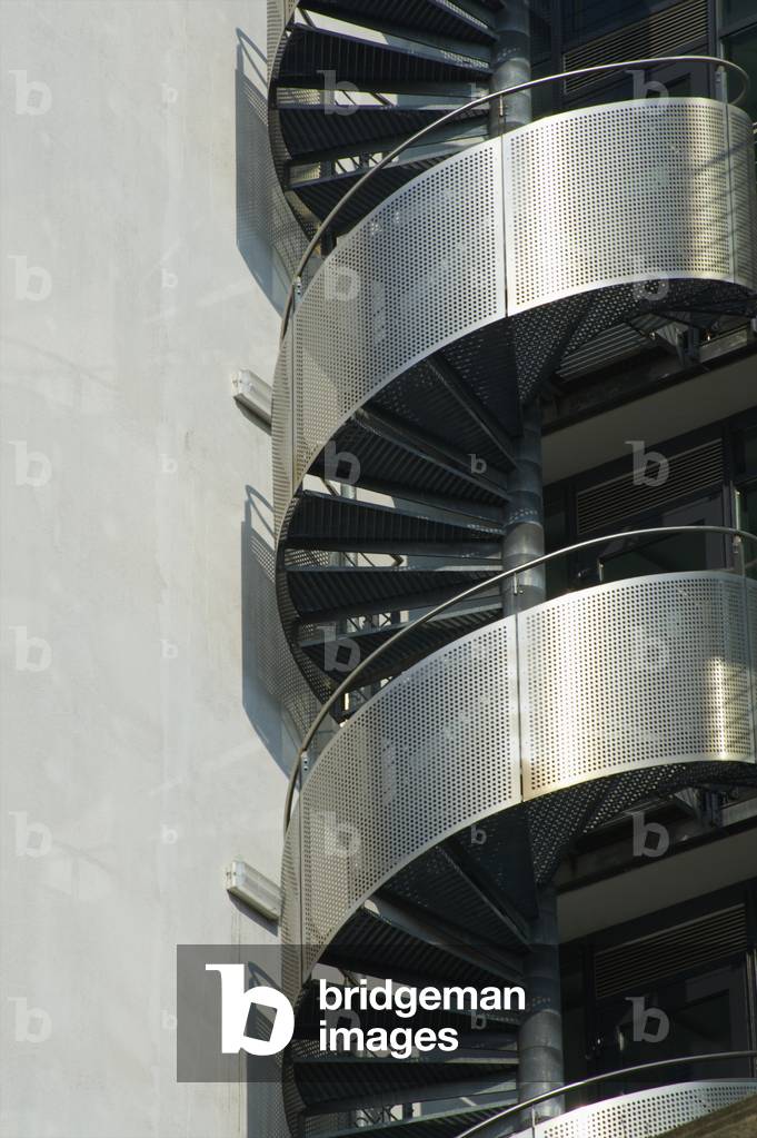 A spiral staircase on the exterior of a building, Hamburg (photo)