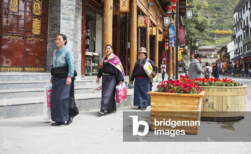 Tibetan Women walking with Shopping Bags, Songpan, Sichuan, China (photo)