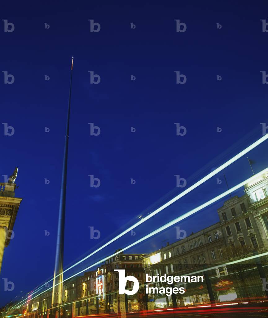 Spire Of Dublin, O'connell Street, Dublin, Ireland; Sculpture Against Traffic Light Streams (photo)
