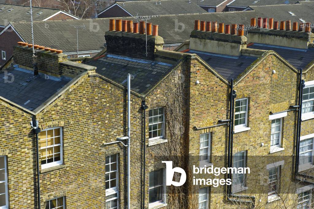 Brick residential buildings with chimneys, Shoreditch, London, England, UK  (photo)