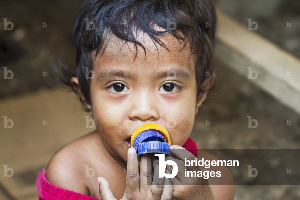Girl at the market, Dili, East Timor (photo)
