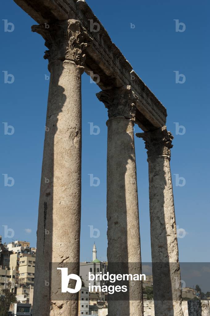 Ancient columns along the walkway outside the Roman Theatre, Amman, Jordan (photo)