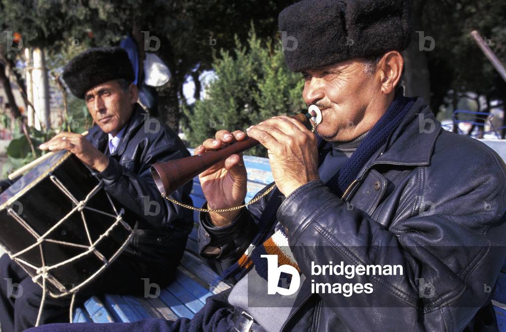 Playing Traditional Musical Instruments (photo)