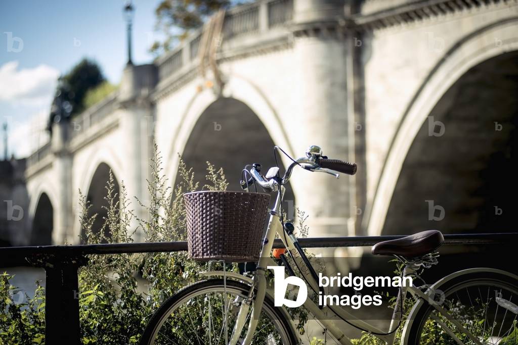 UK, England, UK , Richmond, London, Richmond Park, Bicycle parked near Richmond Bridge (photo)