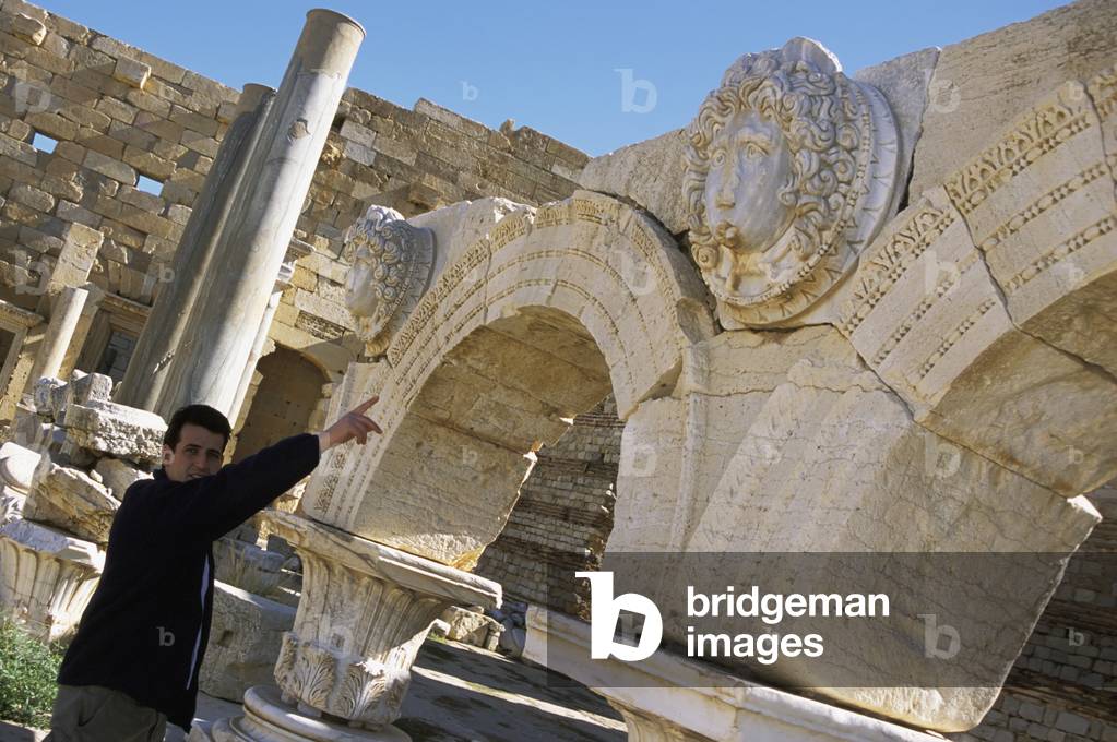 Tourist guide in Imperial Forum. (photo)