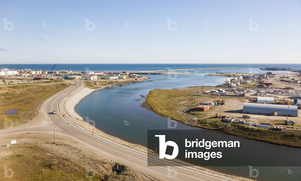 An aerial view of the city of Nome with Russel creek running through the foregound, Arctic Alaska, Summer (photo)