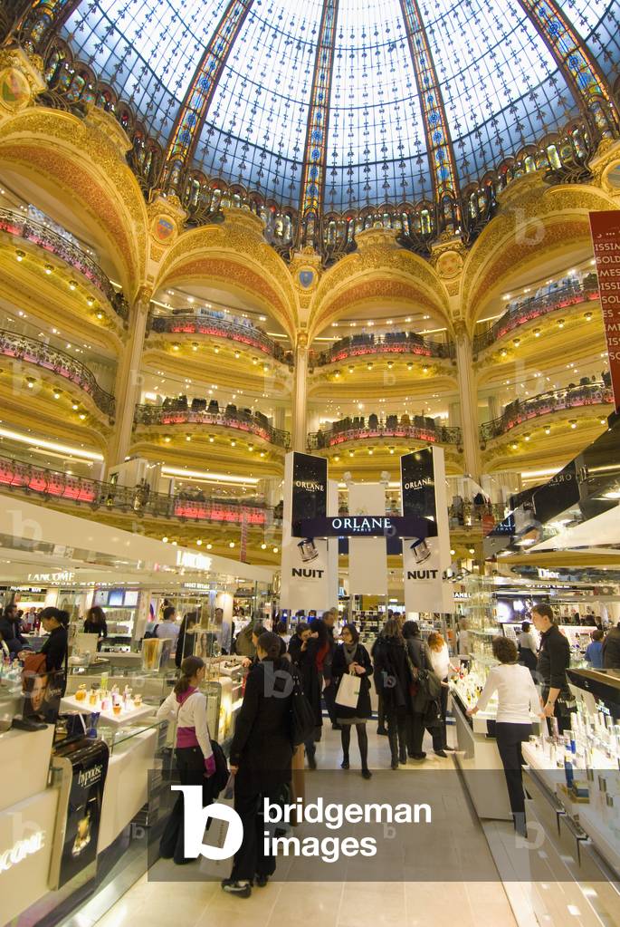 Shoppers Under The Domed Central Area of Galeries Lafayette, Paris, France (photo)