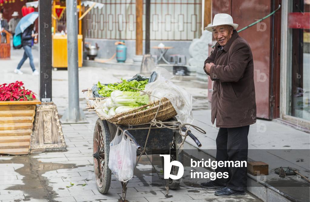Aged Man selling Vegetables on the Street, Songpan, Sichuan, China (photo)