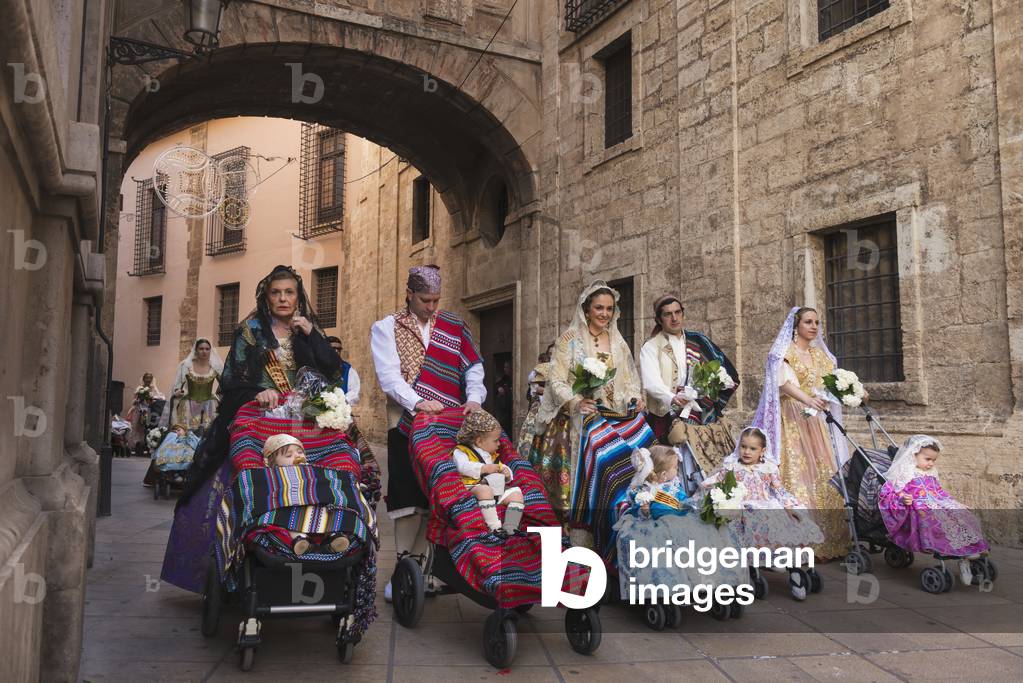 Parents with Babies in Pushchairs Dressed up in Traditional Casal Faller Outfits, Fallas Festival, Valencia, Spain (photo)