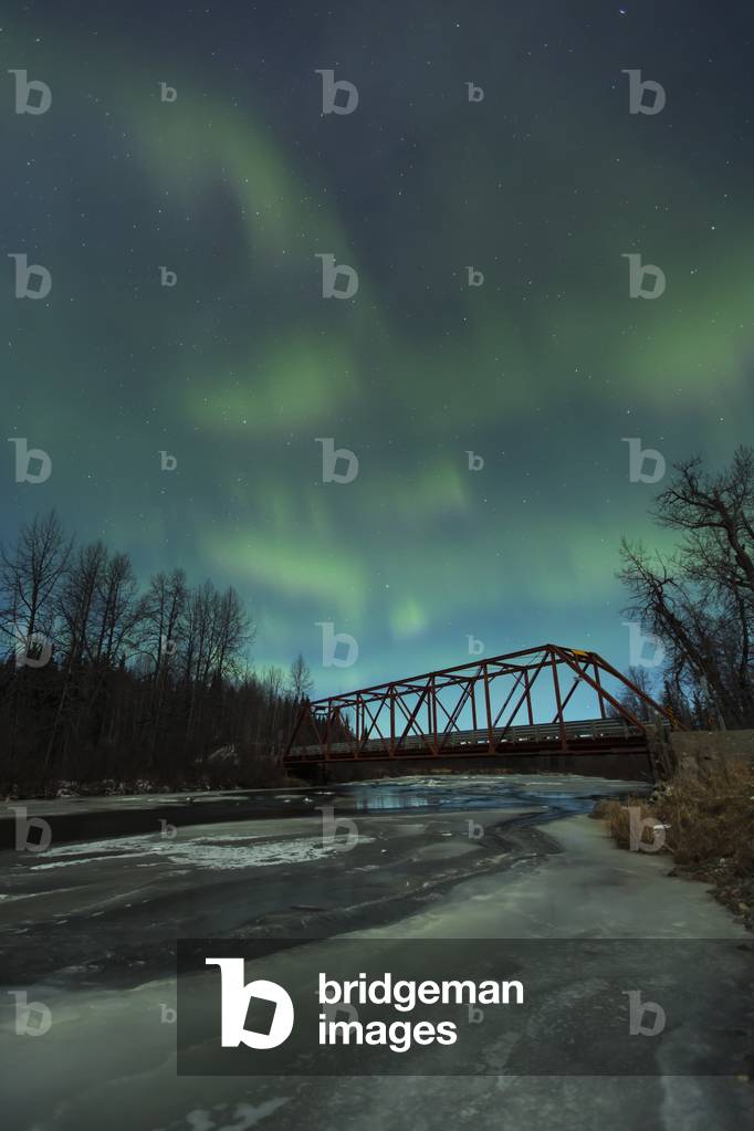 View of green Northern Lights above Peters Creek and the Dollar Creek Bridge, Petersville Road, Southcentral Alaska, Autumn (photo)