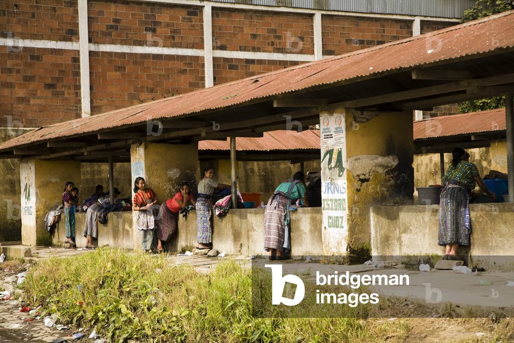 Central America, Women Washing Their Laundry in Communal Outdoor Basins, Patzicia, Guatemala (photo)