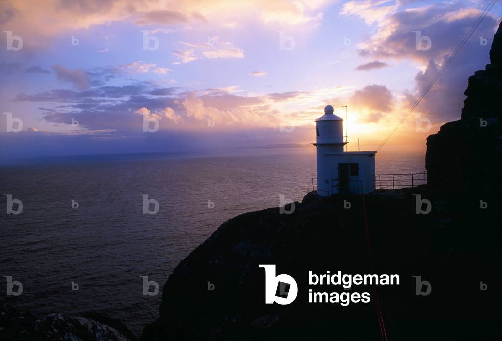 Sheep's Head, County Cork, Ireland; Lighthouse On A Cliff Overlooking The Ocean (photo)