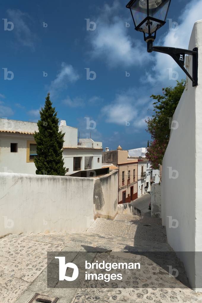 Spain, Ibiza, Looking down alley in Dalt Vila, Ibiza Town (photo)