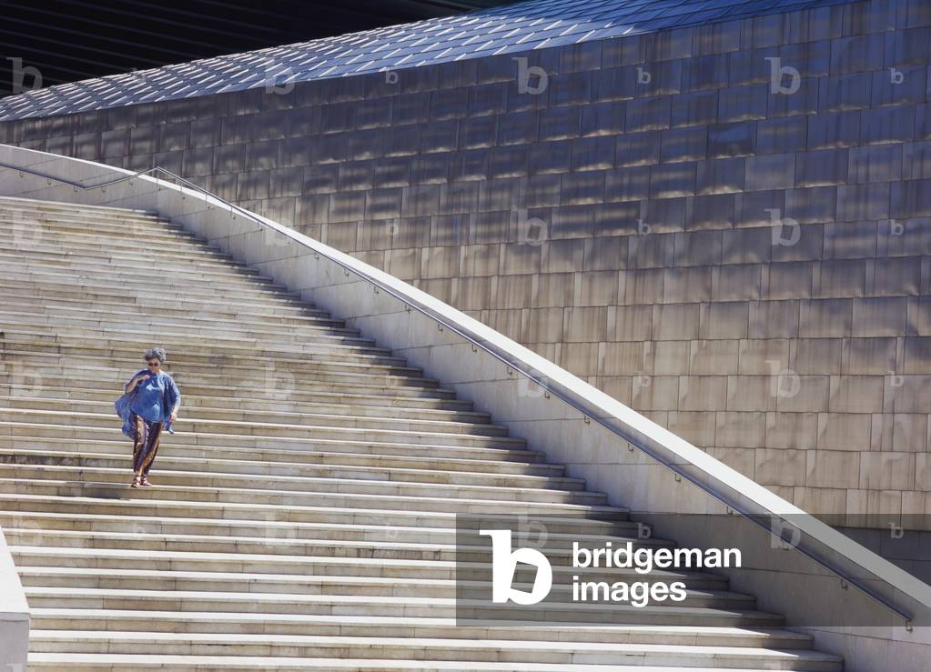 Woman on Steps of Guggenheim Museum (photo)