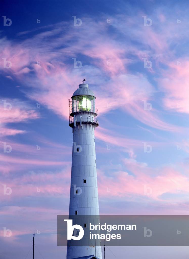 Clouds above Lighthouse at dusk, Kommitjie, Cape Town, South Africa (photo)