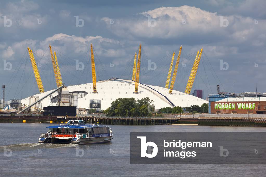 View of the River Thames, the O2 Arena and a transport for London commuter boat, London, England, UK  (photo)