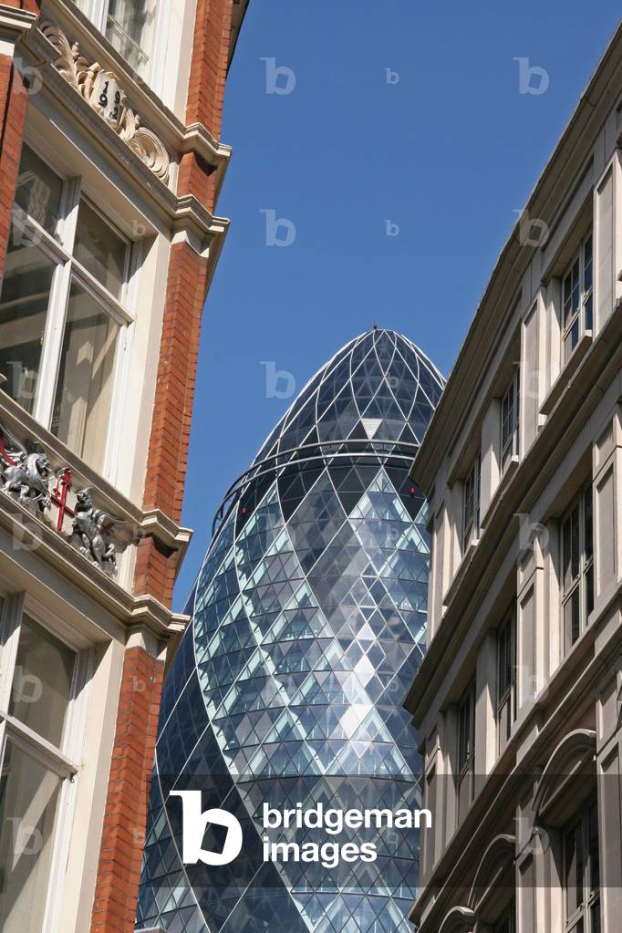The Gerkin Flanked By Old Buildings, the City of London, UK (photo)