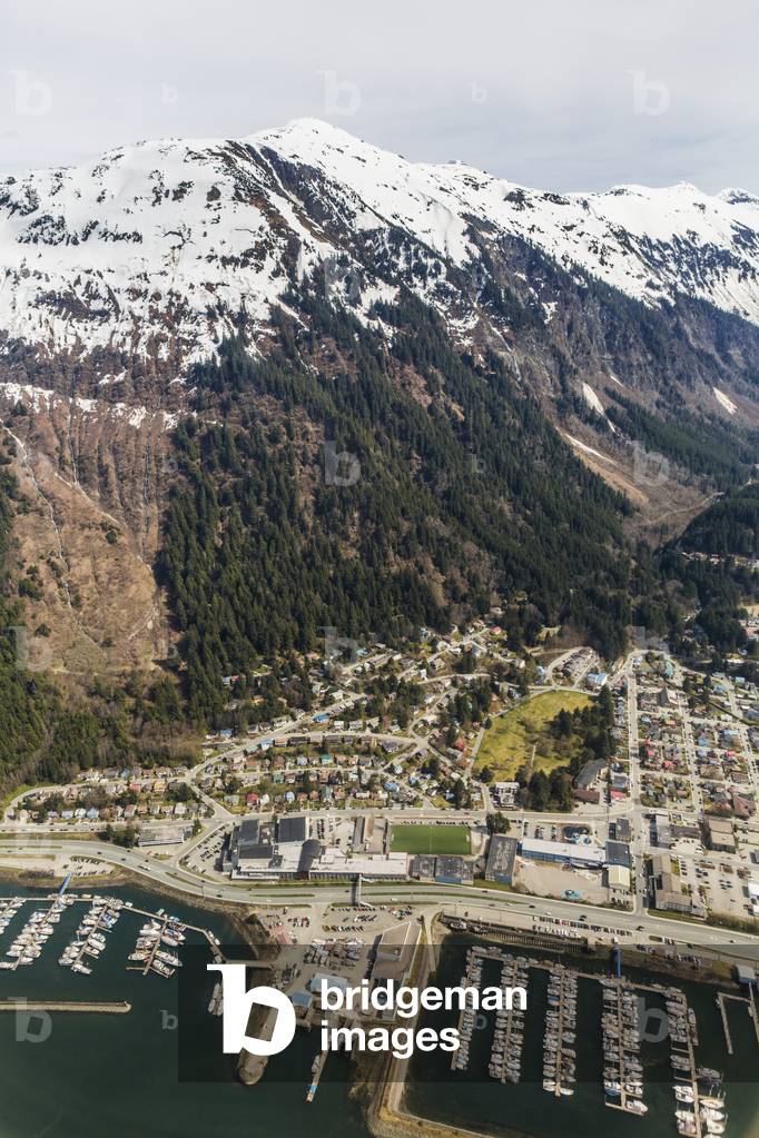 Aerial view of downtown Juneau with snowcapped peaks in the background, Juneau, Southeast Alaska, USA, Spring (photo)